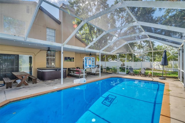 1715 Larabie Ct, Brandon, FL 33511 - view of swimming pool featuring a ceiling fan, a hot tub, a patio, and glass enclosure