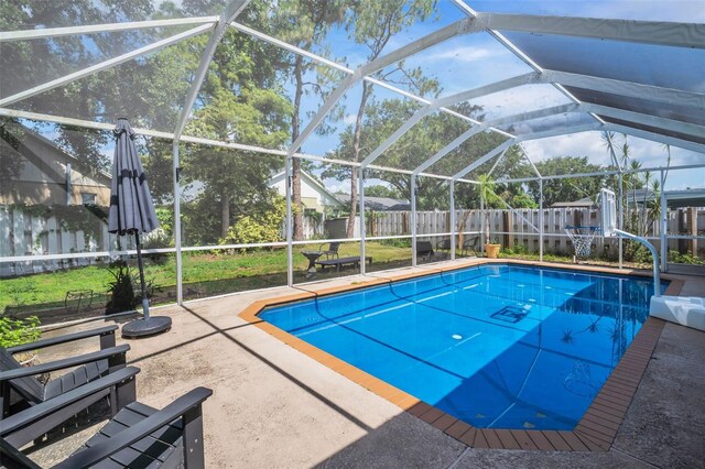 1715 Larabie Ct, Brandon, FL 33511 - view of pool featuring a fenced backyard, a patio area, and glass enclosure
