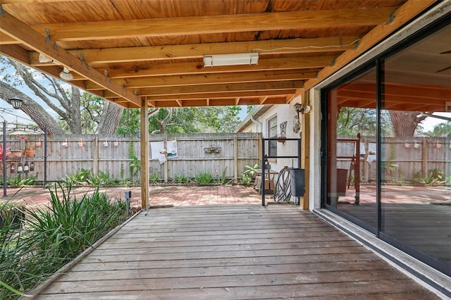 7470 Canterbury St, Spring Hill, FL 34606 - wooden terrace with a fenced backyard