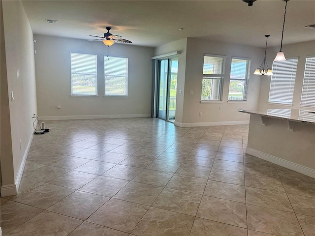 5082 Inshore Landings Dr, Apollo Beach, FL 33572 - spare room with a ceiling fan and light tile patterned floors