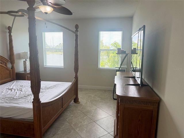 5082 Inshore Landings Dr, Apollo Beach, FL 33572 - bedroom featuring light tile patterned floors and baseboards