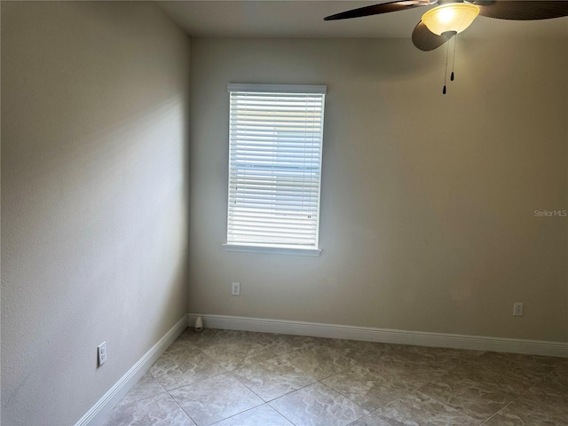 5082 Inshore Landings Dr, Apollo Beach, FL 33572 - empty room with ceiling fan and light tile patterned floors
