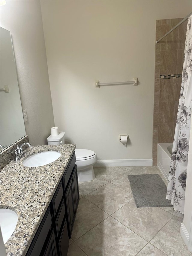 5082 Inshore Landings Dr, Apollo Beach, FL 33572 - bathroom with double vanity, shower / bath combo with shower curtain, and tile patterned floors