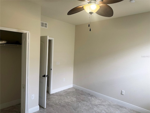 5082 Inshore Landings Dr, Apollo Beach, FL 33572 - unfurnished bedroom featuring a closet and ceiling fan
