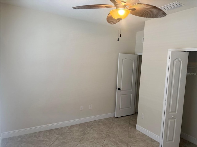 5082 Inshore Landings Dr, Apollo Beach, FL 33572 - spare room with ceiling fan and light tile patterned flooring