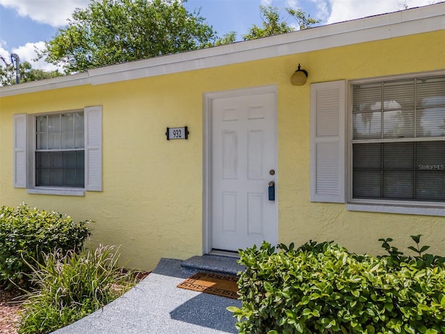932 W Wheeler Rd, Brandon, FL 33510 - entrance to property featuring stucco siding