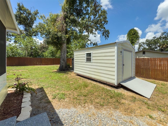 932 W Wheeler Rd, Brandon, FL 33510 - fenced backyard with a storage shed