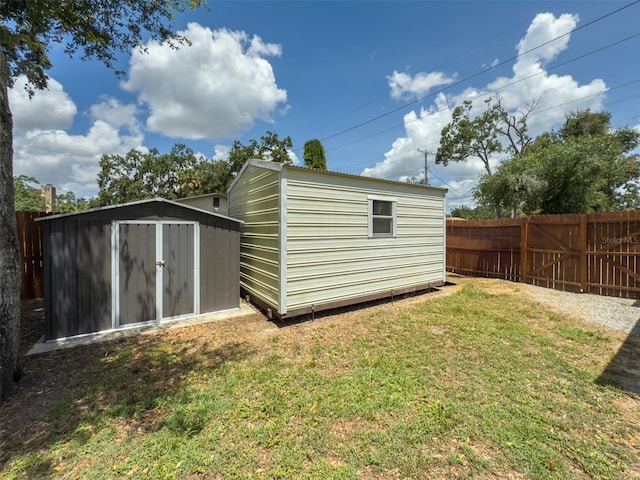932 W Wheeler Rd, Brandon, FL 33510 - view of shed with a fenced backyard