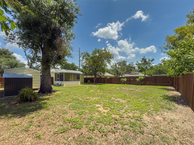 932 W Wheeler Rd, Brandon, FL 33510 - fenced backyard with a storage shed