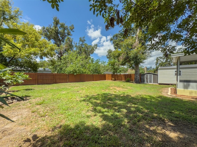 932 W Wheeler Rd, Brandon, FL 33510 - fenced backyard with a shed
