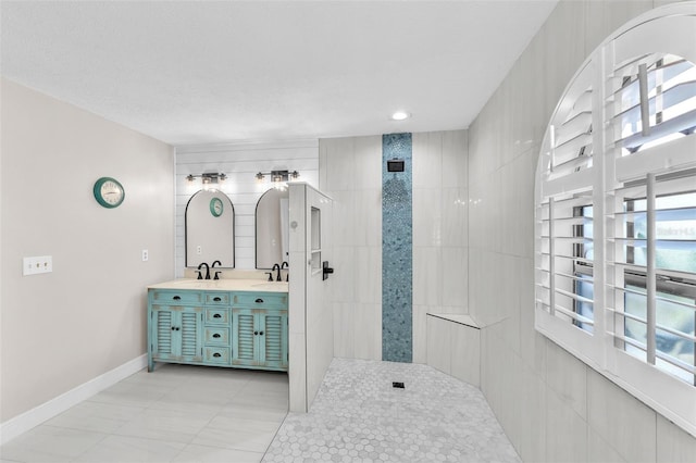 832 Birdie Way, Apollo Beach, FL 33572 - full bathroom with walk in shower, double vanity, and tile patterned flooring