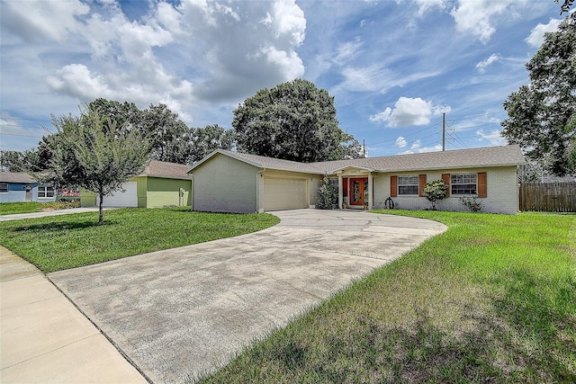 14047 Briardale Ln, Tampa, FL 33618 - single story home featuring a garage, concrete driveway, and brick siding