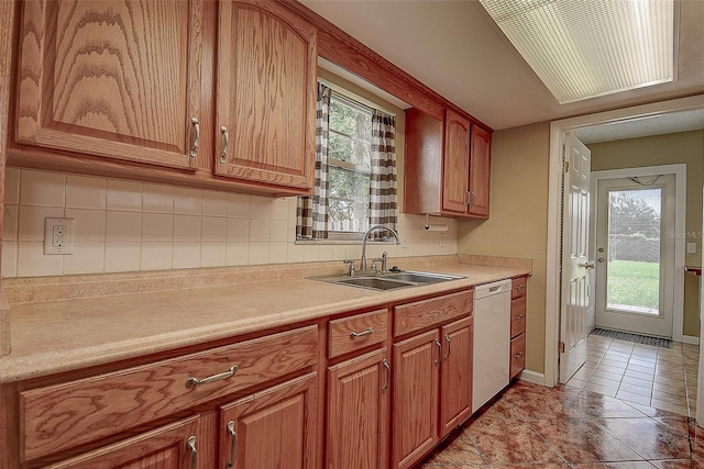14047 Briardale Ln, Tampa, FL 33618 - kitchen featuring dishwasher, light countertops, tasteful backsplash, and healthy amount of natural light