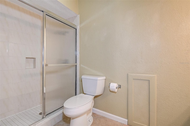 14047 Briardale Ln, Tampa, FL 33618 - full bath featuring a shower stall and tile patterned flooring