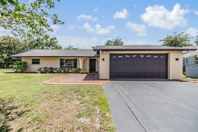 4228 Belle Isle Ct, New Port Richey, FL 34653 - ranch-style house featuring stucco siding, driveway, an attached garage, and a front yard