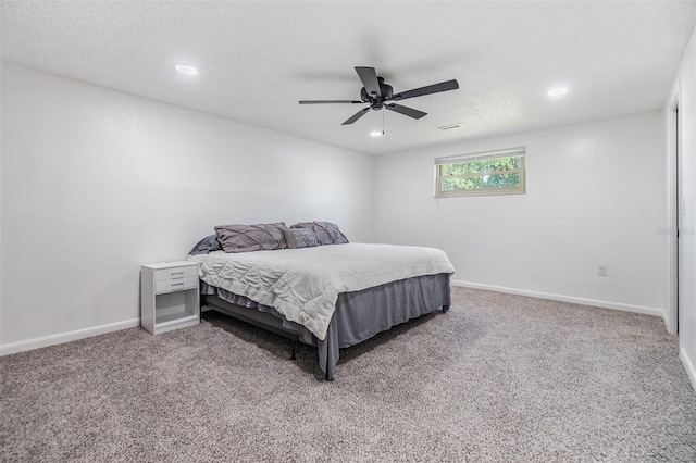 4228 Belle Isle Ct, New Port Richey, FL 34653 - bedroom featuring light carpet, recessed lighting, ceiling fan, and a textured ceiling