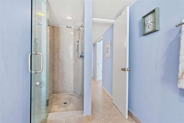 1290 Gulf Blvd Unit 702, Clearwater Beach, FL 33767 - bathroom featuring tile patterned flooring and a stall shower