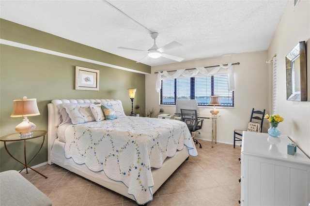 1290 Gulf Blvd Unit 702, Clearwater Beach, FL 33767 - bedroom with light tile patterned floors, a ceiling fan, and a textured ceiling