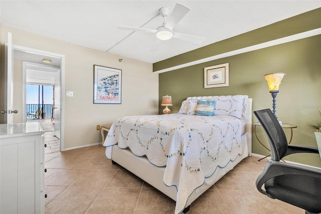 1290 Gulf Blvd Unit 702, Clearwater Beach, FL 33767 - bedroom featuring light tile patterned floors and a ceiling fan