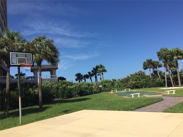 1290 Gulf Blvd Unit 702, Clearwater Beach, FL 33767 - view of grassy yard featuring community basketball court