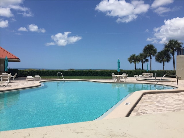 1290 Gulf Blvd Unit 702, Clearwater Beach, FL 33767 - community pool with a patio area