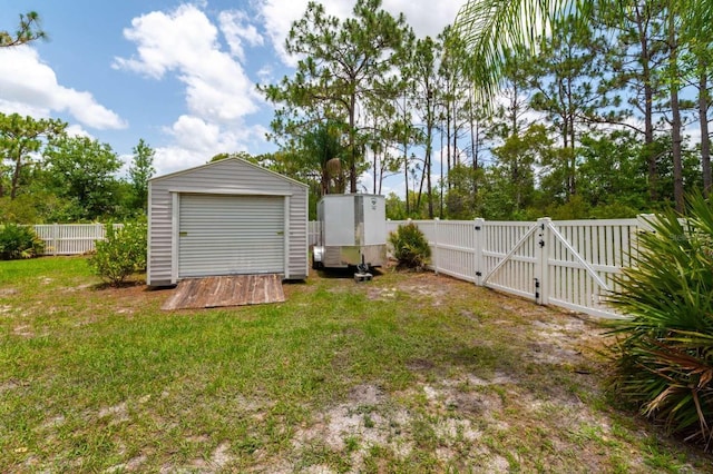 7725 235th St E, Myakka City, FL 34251 - fenced backyard with a gate and a storage unit