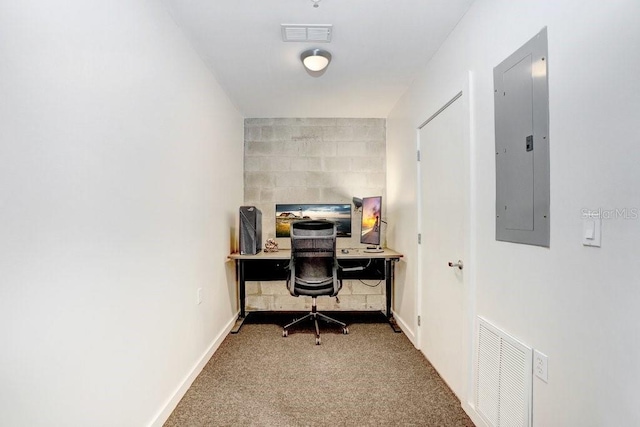 2001 E 2nd Ave Unit 37, Tampa, FL 33605 - carpeted office space featuring electric panel and baseboards