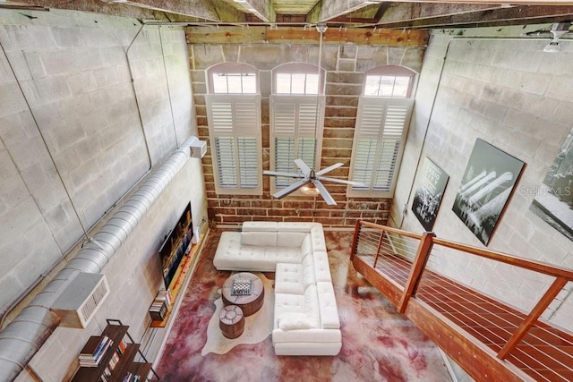 2001 E 2nd Ave Unit 37, Tampa, FL 33605 - living area featuring a fireplace and a ceiling fan