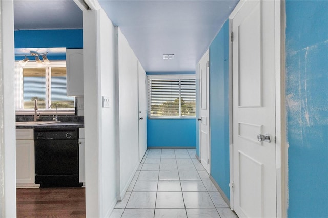 638 La Jolla Ave, Sun City Center, FL 33573 - corridor featuring a sink and baseboards