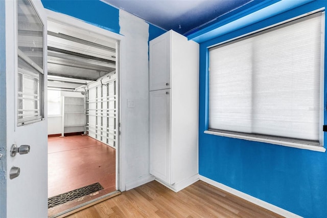 638 La Jolla Ave, Sun City Center, FL 33573 - unfurnished bedroom featuring wood finished floors and baseboards