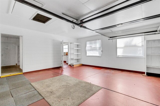 638 La Jolla Ave, Sun City Center, FL 33573 - garage featuring baseboards