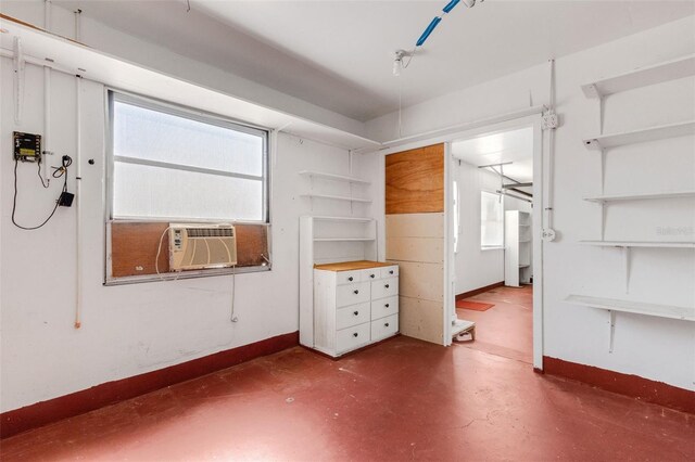638 La Jolla Ave, Sun City Center, FL 33573 - spare room featuring concrete flooring and cooling unit