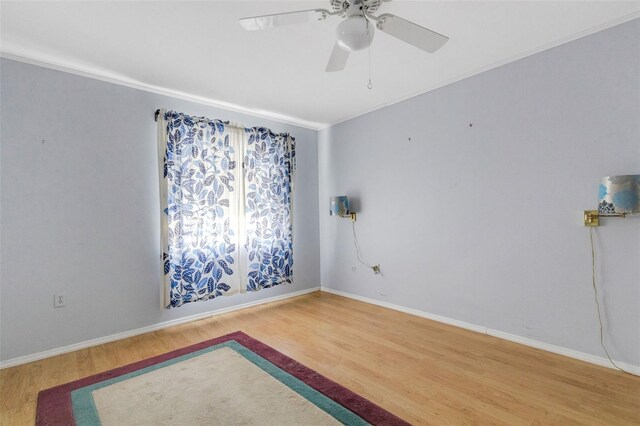 638 La Jolla Ave, Sun City Center, FL 33573 - empty room with wood finished floors, a ceiling fan, and crown molding