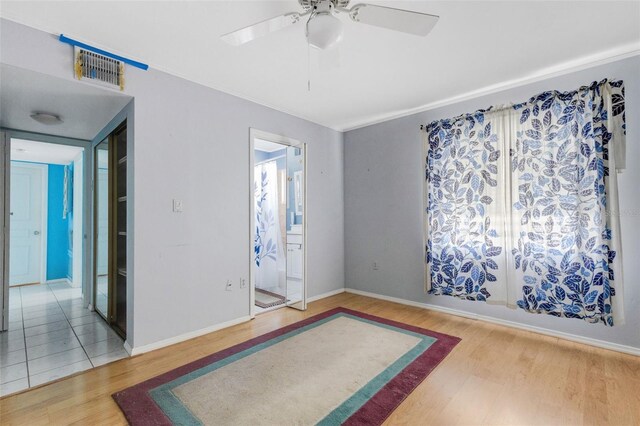 638 La Jolla Ave, Sun City Center, FL 33573 - spare room featuring wood finished floors and a ceiling fan