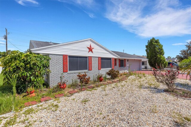 638 La Jolla Ave, Sun City Center, FL 33573 - ranch-style house with a garage and brick siding