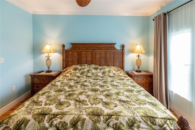 2724 Via Murano Unit 639, Clearwater, FL 33764 - bedroom with wood finished floors and crown molding