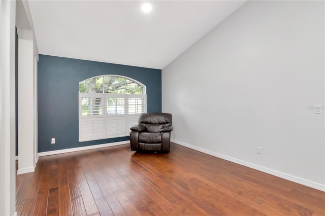 18004 Clear Lake Dr, Lutz, FL 33548 - unfurnished room with hardwood / wood-style flooring and lofted ceiling