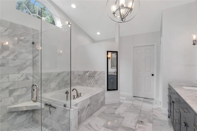18004 Clear Lake Dr, Lutz, FL 33548 - full bath with vanity, a garden tub, a stall shower, a chandelier, and marble finish flooring