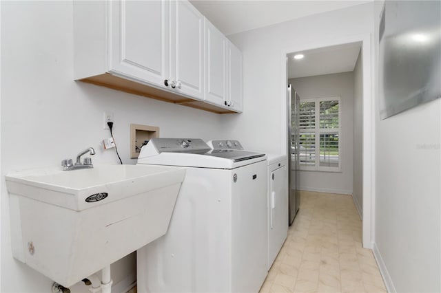 18004 Clear Lake Dr, Lutz, FL 33548 - laundry area featuring cabinet space and independent washer and dryer