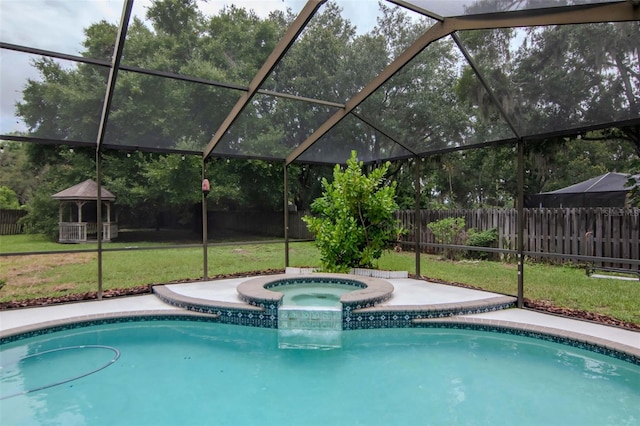 18004 Clear Lake Dr, Lutz, FL 33548 - view of swimming pool with a fenced backyard, glass enclosure, and a pool with connected hot tub
