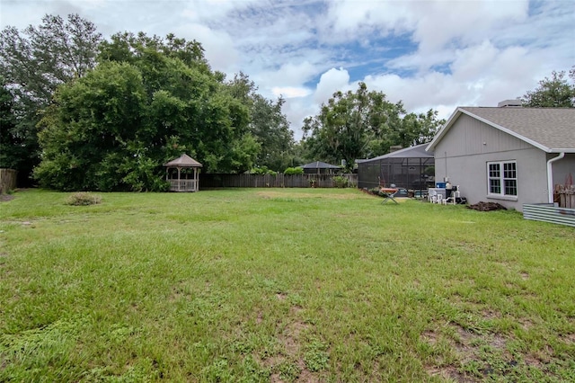 18004 Clear Lake Dr, Lutz, FL 33548 - fenced backyard with a gazebo and glass enclosure