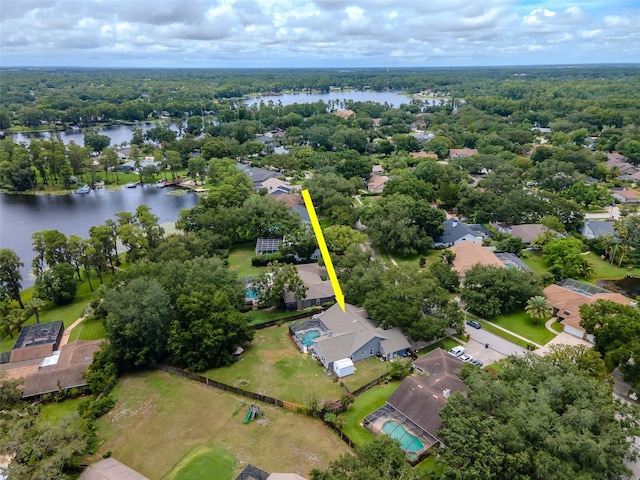 18004 Clear Lake Dr, Lutz, FL 33548 - aerial perspective of suburban area with a nearby body of water