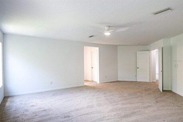10605 Marsanne Pl, Riverview, FL 33578 - carpeted empty room with ceiling fan and a textured ceiling
