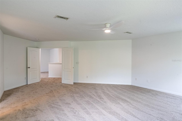 10605 Marsanne Pl, Riverview, FL 33578 - carpeted empty room featuring ceiling fan and a textured ceiling