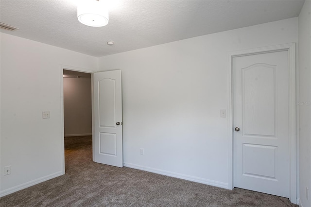 10605 Marsanne Pl, Riverview, FL 33578 - carpeted spare room with baseboards and a textured ceiling