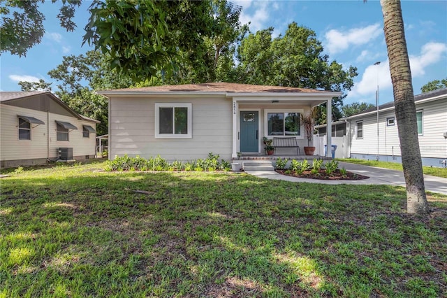 2834 10th Ave N, Saint Petersburg, FL 33713 - view of front of property featuring a front lawn and covered porch