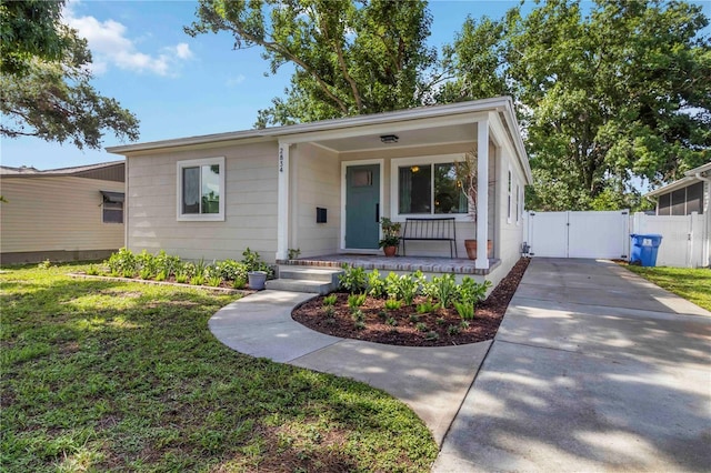 2834 10th Ave N, Saint Petersburg, FL 33713 - bungalow with a gate, a porch, and driveway