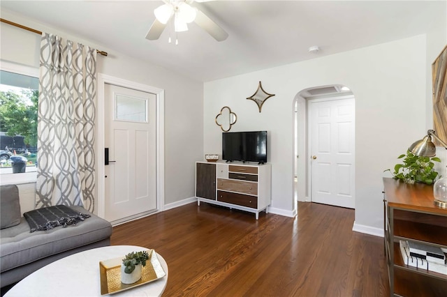 2834 10th Ave N, Saint Petersburg, FL 33713 - living area featuring arched walkways, ceiling fan, and wood finished floors