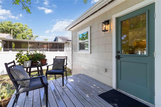 2834 10th Ave N, Saint Petersburg, FL 33713 - wooden terrace featuring a sunroom