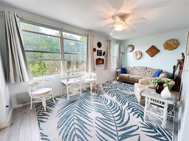 2330 Ecuadorian Way Unit 30, Clearwater, FL 33763 - living room with a ceiling fan and wood finished floors